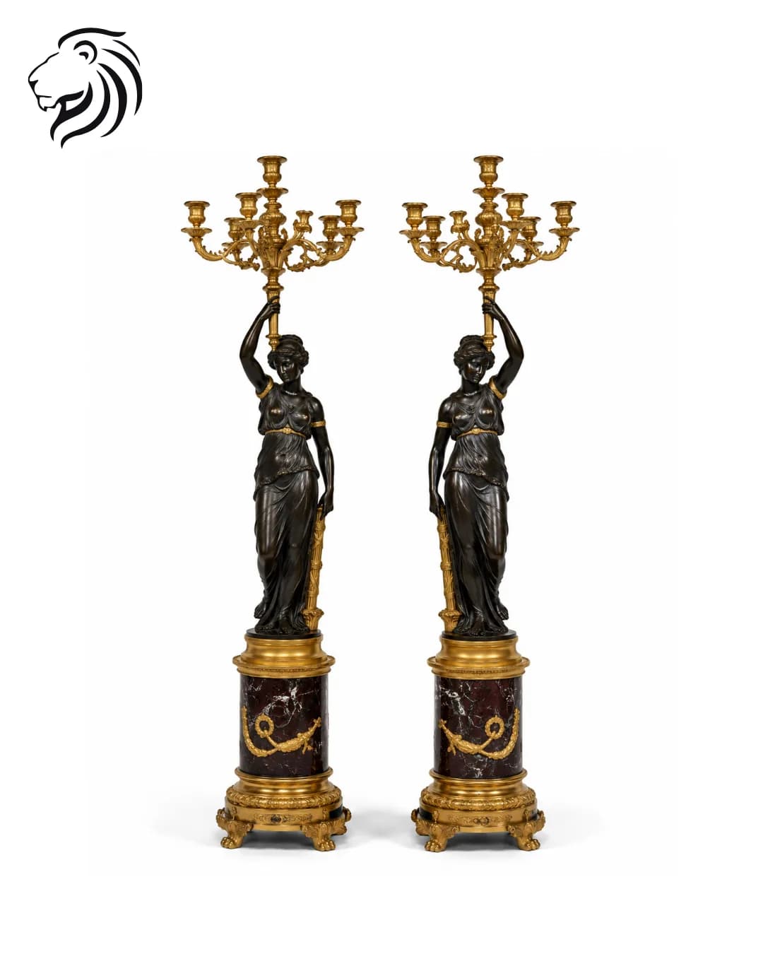 Paire de torchères à figures féminines